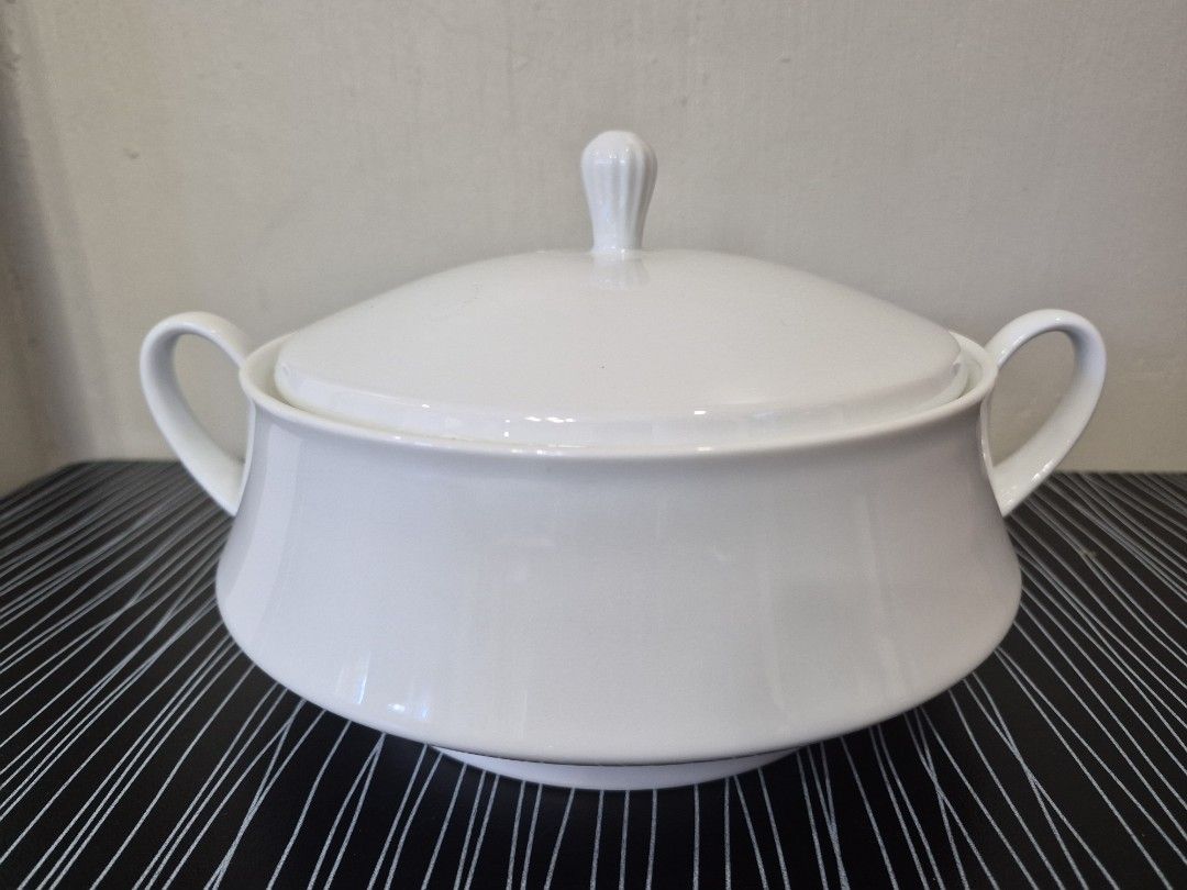 Noritake Legacy White Soup Tureen with Lid (Category: Dinnerware & Cutlery) located in Cainta. Submitted by gerlaystreasures (Listing ID 1427810568, Image 1). Description: Aurhentic Noritake Legacy Series Product 3.5 inches deep 8.5 inches wide Elegant white soup tureen with a matching lid. Features two side handles for easy carrying and a decorative knob on the lid. The tureen has a classic, rounded shape. The bottom of the tureen has a brand ma