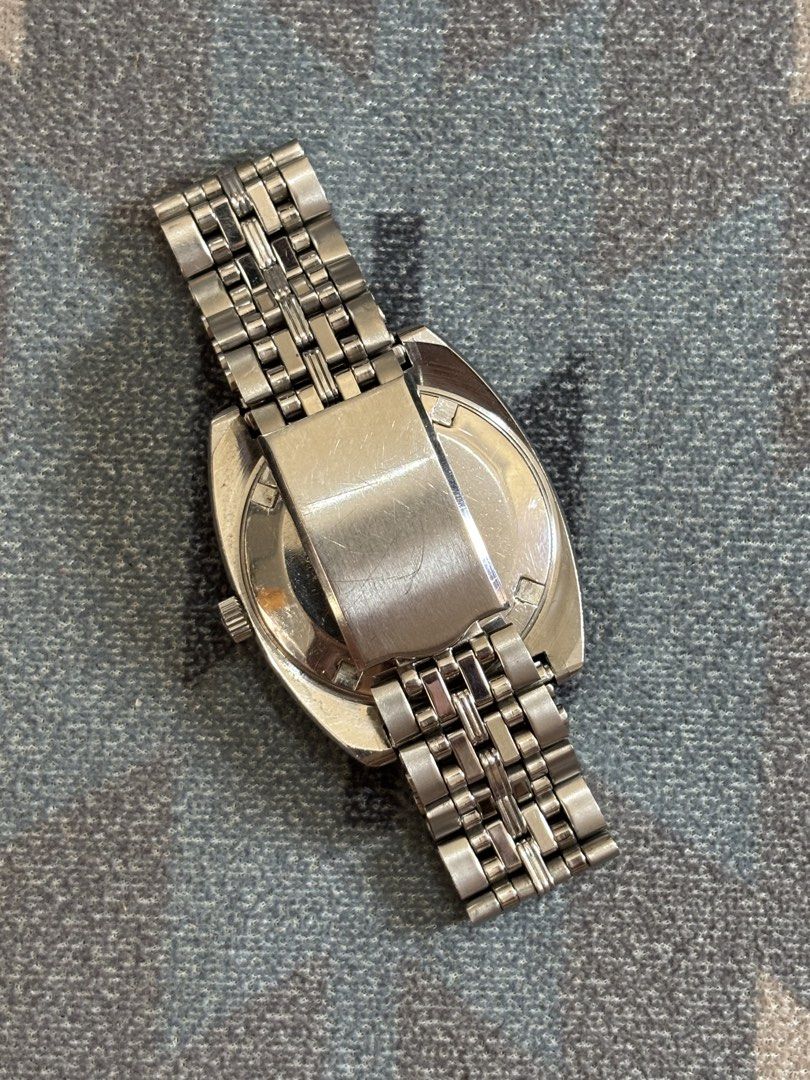 Rado Conway Vintage Automatic Vertical Day Date TV Case (Category: Luxury Watches) located in Cebu City. Submitted by anythingwithvalue (Listing ID 1427850865, Image 2). Description: Rado Conway. vintage Swiss automatic. collectible 70s design. automatic movement. mechanical. no battery. 1970s production. classic Rado era. Conway model. less common. distinctive layout. silver sunburst dial. clean vintage look. vertical day-date at 6. unique featu