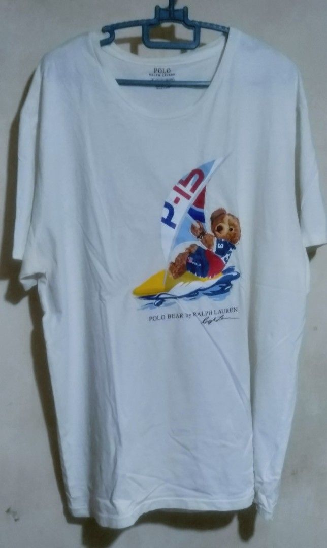 Ralph Lauren 💯 authentic (Category: Activewear) located in Naga. Submitted by pec3c (Listing ID 1427869304, Image 2). Description: - Authentic Ralph Lauren Polo Bear T-shirt - White color - XL size - no crack print - Features the iconic Polo Bear sailing design - Length 22 - Width 28.