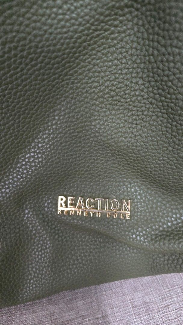 Reaction Kenneth Cole Green Handbag (Category: Luxury Bags & Wallets) located in Quezon City. Submitted by k8_wallace (Listing ID 1427802204, Image 3). Description: Olive Green pebbled texture Authentic .