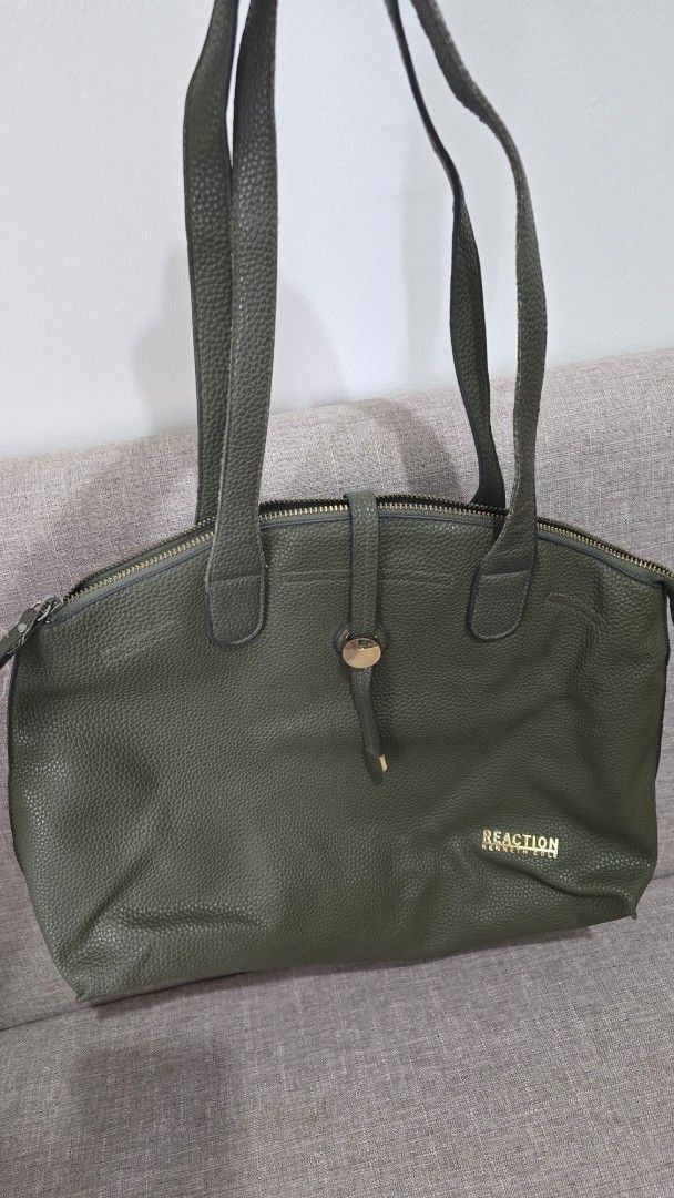 Reaction Kenneth Cole Green Handbag (Category: Luxury Bags & Wallets) located in Quezon City. Submitted by k8_wallace (Listing ID 1427802204, Image 1). Description: Olive Green pebbled texture Authentic .