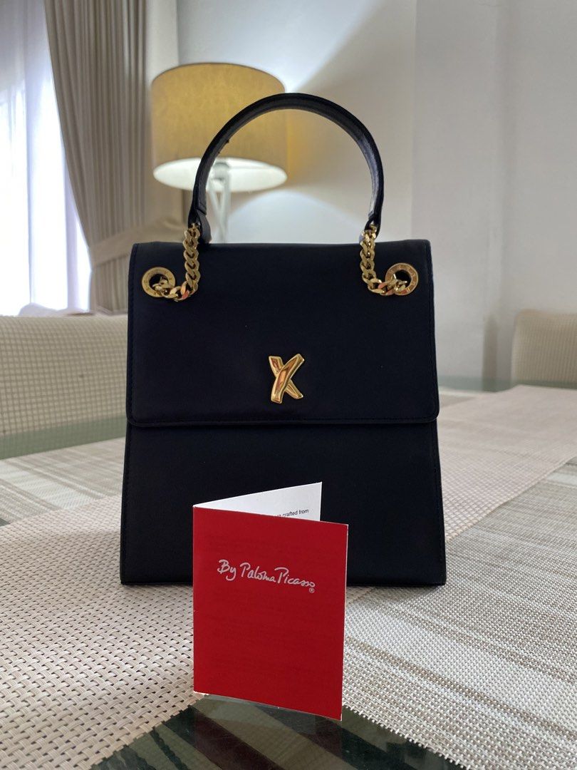 Selling this OG Paloma Picasso Bag (Category: Shoulder Bags) located in Valencia. Submitted by negnikkah (Listing ID 1427848866, Image 1). Description: Selling this OG Paloma Picasso mini bag. It is still in like-new condition, interior is still very clean pa,It also comes with its original brand card. MOP: Gcash The shipping fee will be shouldered by the buyer. I can ship via LBC or J&T. Location: Valencia City, Bukidnon. Can meet up if you’re n