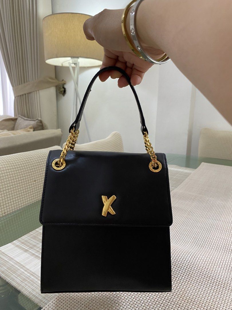 Selling this OG Paloma Picasso Bag (Category: Shoulder Bags) located in Valencia. Submitted by negnikkah (Listing ID 1427848866, Image 2). Description: Selling this OG Paloma Picasso mini bag. It is still in like-new condition, interior is still very clean pa,It also comes with its original brand card. MOP: Gcash The shipping fee will be shouldered by the buyer. I can ship via LBC or J&T. Location: Valencia City, Bukidnon. Can meet up if you’re n
