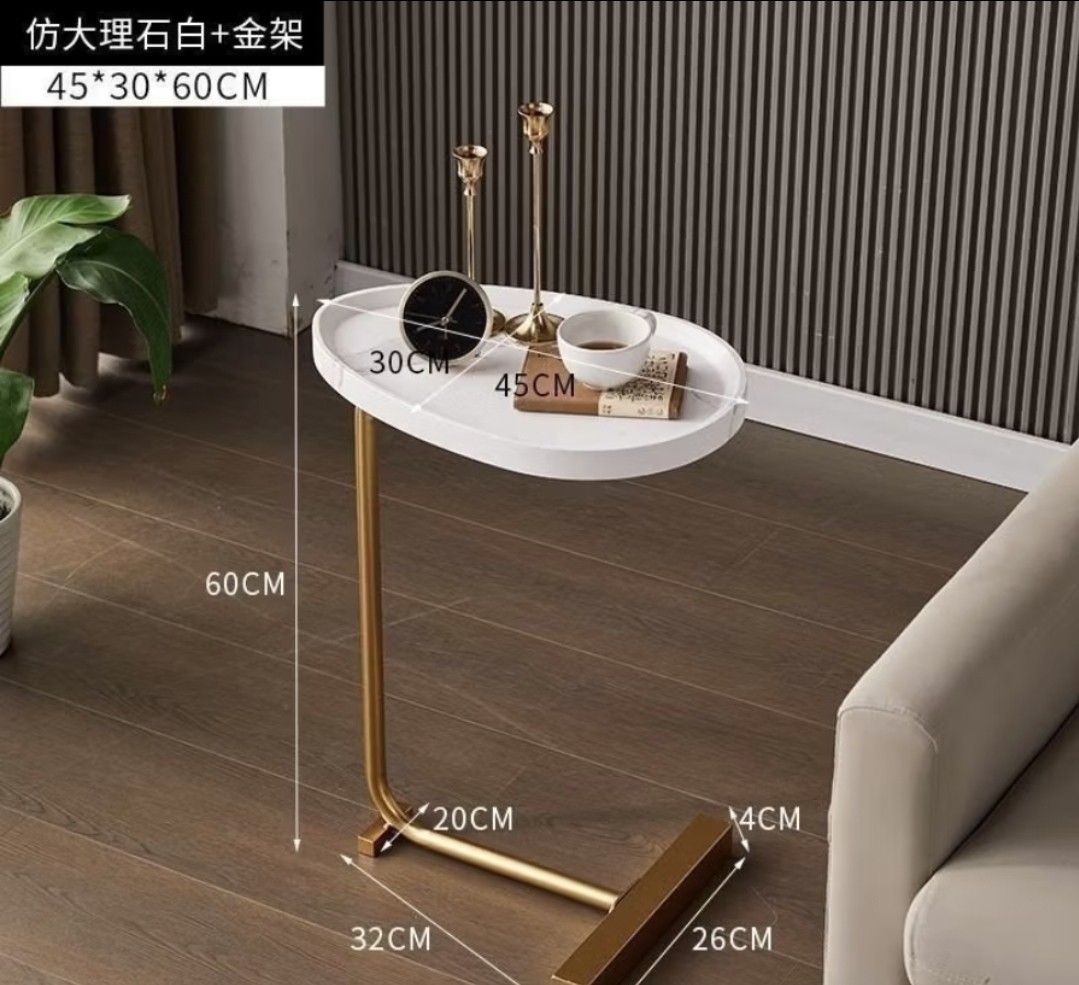 Side Table (Category: Tables & Sets) located in Singapore. Submitted by blogshoppedx (Listing ID 1427836240, Image 1). Description: Stylish and functional side table. Features a white marble-look top and a gold-colored. Perfect for holding drinks, snacks, or other essentials. Table top is wood material. Fixed height 60cm.