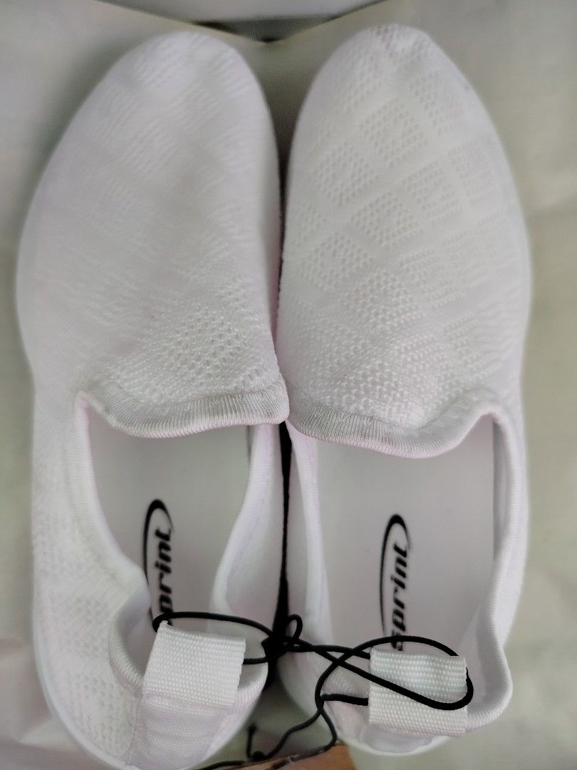 Sprint White Slip-on Shoes (Category: Sneakers) located in Pasay City. Submitted by secondhandshop3 (Listing ID 1427808904, Image 2). Description: Brand New From 599 to 399.