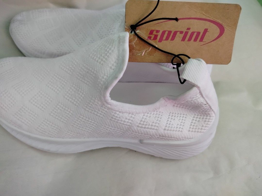 Sprint White Slip-on Shoes (Category: Sneakers) located in Pasay City. Submitted by secondhandshop3 (Listing ID 1427808904, Image 3). Description: Brand New From 599 to 399.