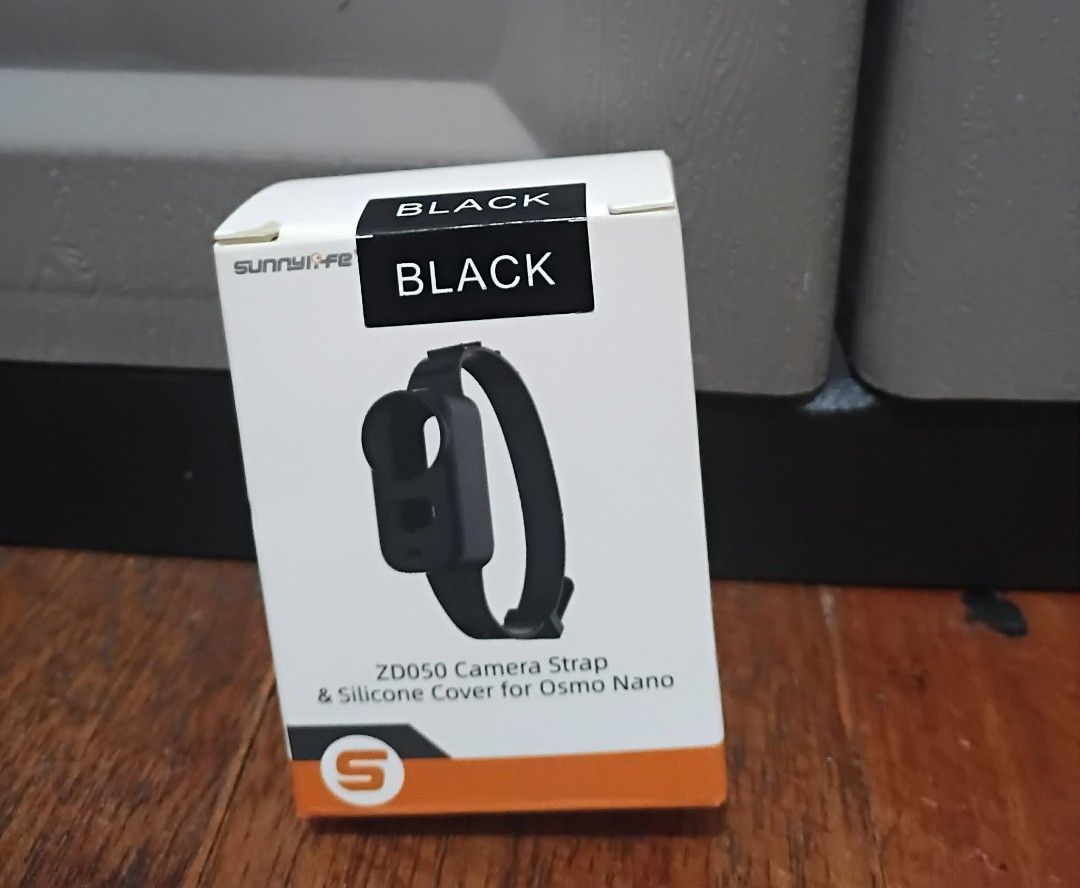 SunnyLIFE ZD050 Camera Strap for Osmo Nano (Category: Camera Bags & Carriers) located in Manila. Submitted by chinggayg.190 (Listing ID 1427866211, Image 1). Description: Upgrade your Osmo Nano experience with the Sunnylife ZD050 Camera Strap & Silicone Cover (Black) — the perfect combo for protection, comfort, and everyday convenience! Designed with a soft, durable silicone case, it keeps your Osmo Nano safe from scratches, bumps, dust, and dail