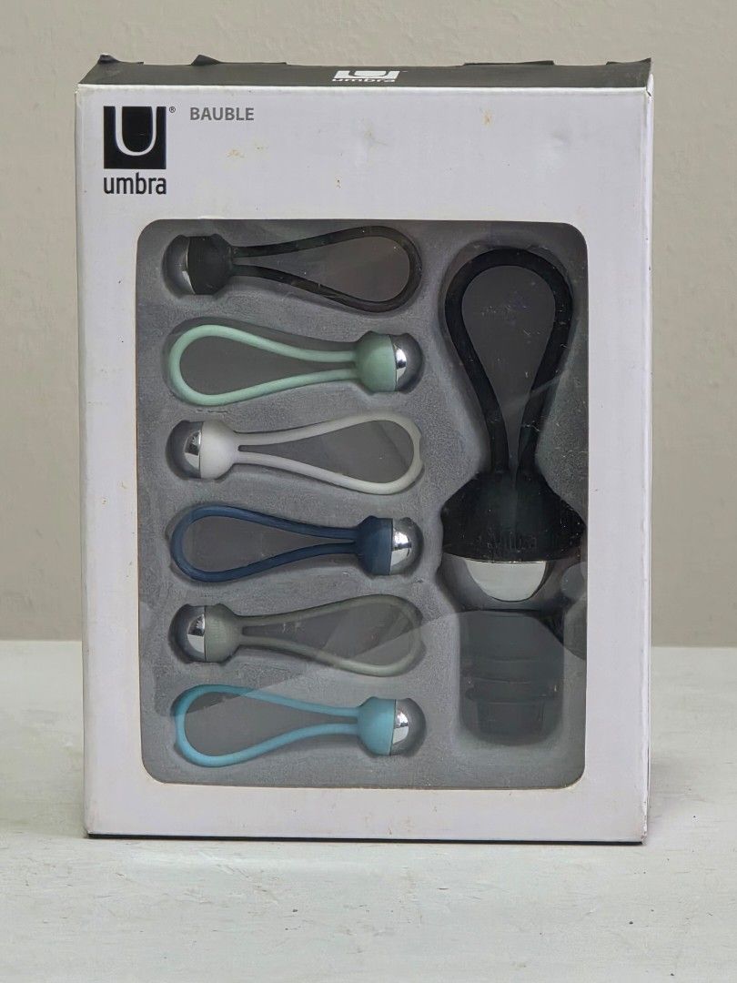 Umbra Bauble Wine Charms & Topper Set (Category: Water Bottles & Tumblers) located in Manila. Submitted by tch_86 (Listing ID 1427802570, Image 2). Description: Umbra Bauble set includes a wine bottle stopper and seven wine glass charms. The charms come in various colors. The box indicates the set is designed in England. It is a complete set with 7 pieces. Perfect for parties or as a gift..
