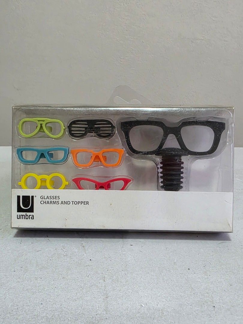 Umbra Glasses Charms and Topper Set (Category: Other Home Decor) located in Manila. Submitted by tch_86 (Listing ID 1427802266, Image 1). Description: Clearance sale!!! Box is not presentable. .