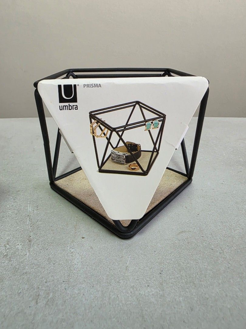 Umbra Prisma Jewelry Organizer (Category: Accessory Holder, Box & Organizers) located in Manila. Submitted by tch_86 (Listing ID 1427798840, Image 1). Description: Dimension : 6x6x4" Accessory/ jewelry organizer Matte Brass outer and linen inner material .