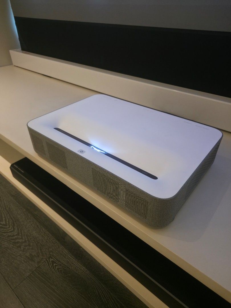 VAVA 4K UST Laser Projector VA-LT002 (Category: Projectors) located in Mandaluyong City. Submitted by lbear29 (Listing ID 1427788539, Image 3). Description: Barely used 4k Ultra Short Throw Projector for sale. Good as new. Comes with original box. Capable of projecting up to 150 inches Harman Karman Audio Reason for sale: Moving houses. No longer need .