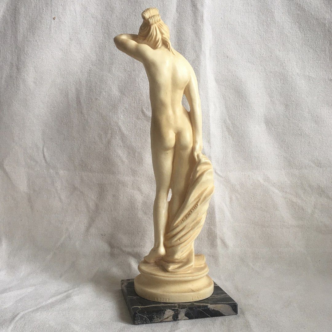 Vintage A. Santini Sculpture (Category: Vintage Collectibles) located in Lapu Lapu. Submitted by pickershub (Listing ID 1427813137, Image 2). Description: Vintage A. Santini Sculpture VGUC Approx. 9” Marked Sticker intact Made in Italy Made of resin alabaster composite Sold “as-is” .