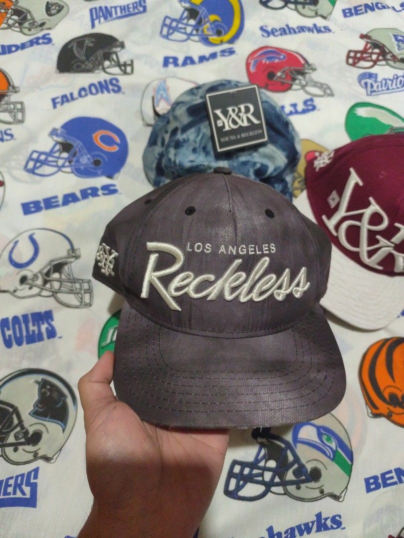 Y&R Reckless Caps ASPACK RUSH NEED CASH (Category: Caps & Hats) located in Baguio. Submitted by FRANKLIN (Listing ID 1427889998, Image 2). Description: Three Y&R Reckless caps are available. One is dark grey with "Los Angeles Reckless" on the front. Another is blue tie-dye with the Y&R logo. The third is maroon with a white brim and "Y&R" in large letters. All caps have adjustable straps at the back..