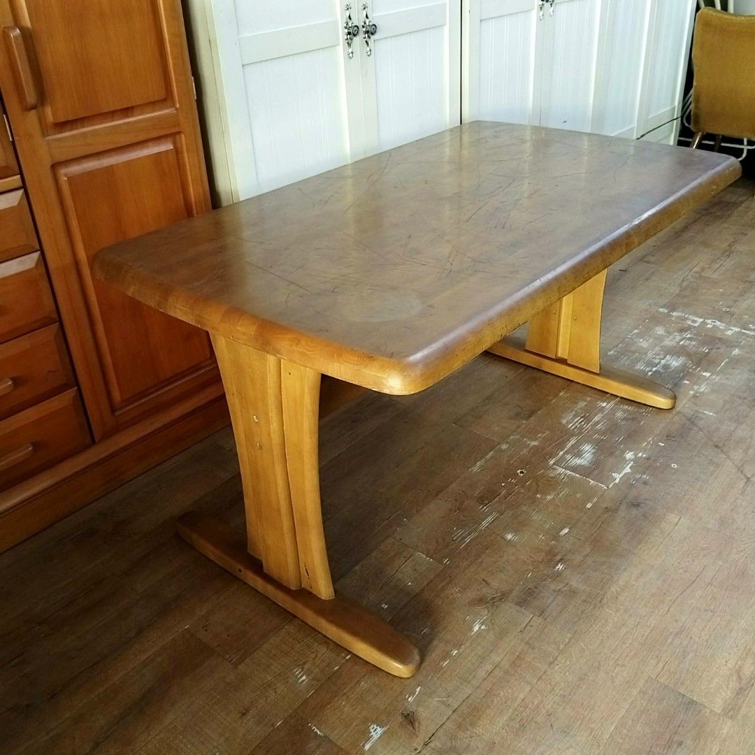 2nd hand ONISHI SANGYO Dining Table | Solid Wood (Category: Tables & Sets) located in Paranaque City. Submitted by feybelhaft (Listing ID 1428036133, Image 1). Description: Solid wooden table by Onishi Sangyo. Features a rectangular tabletop with rounded edges and sturdy, curved legs. Dimensions are L130cm x W80cm x H70cm. The table has a natural wood finish. Perfect for dining or as a workspace. A classic piece that adds warmth to any room..