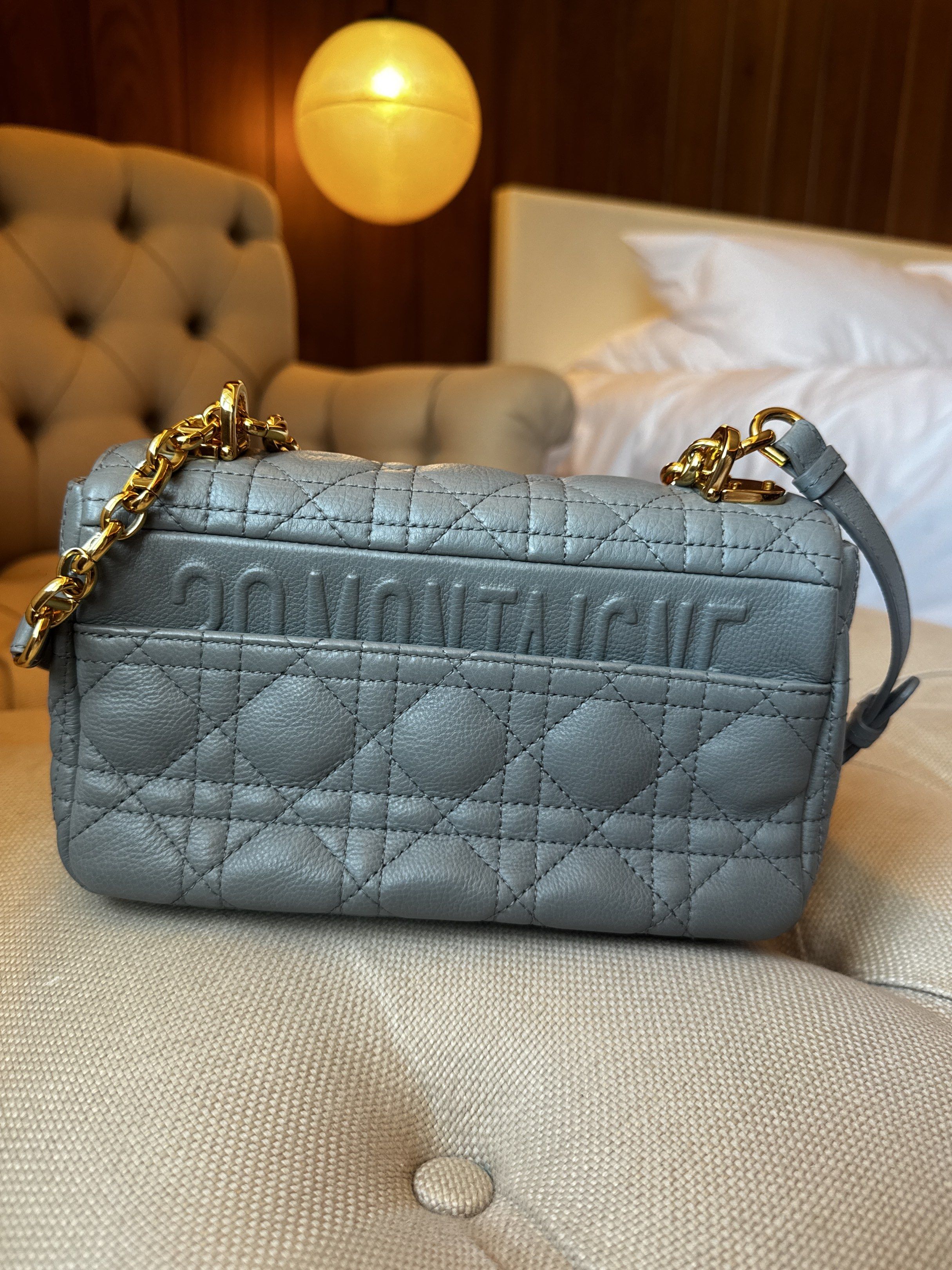 Authentic Dior Caro Bag Small (Category: Luxury Bags & Wallets) located in Makati City. Submitted by theladyluxxe (Listing ID 1427948853, Image 3). Description: - Authentic Dior Caro Bag - Small size - stone gray color - mint condition. No wears/stains - minimal hairline scratches on hardware. not visible - Features the signature Cannage stitching - Interior zip pocket and slip pocket Back pocket Dimensions: 20 x 13.5 x 7 cm / 8 x 5.5 x 3 inches 