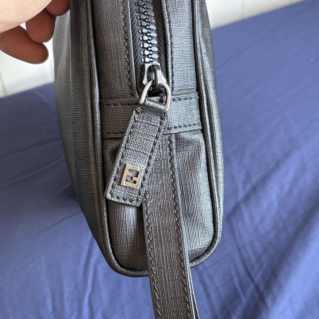 Authentic Fendi Zucca Wrislet Pouch (Category: Luxury Bags & Wallets) located in Manila. Submitted by snatchmybag (Listing ID 1428054626, Image 2). Description: .