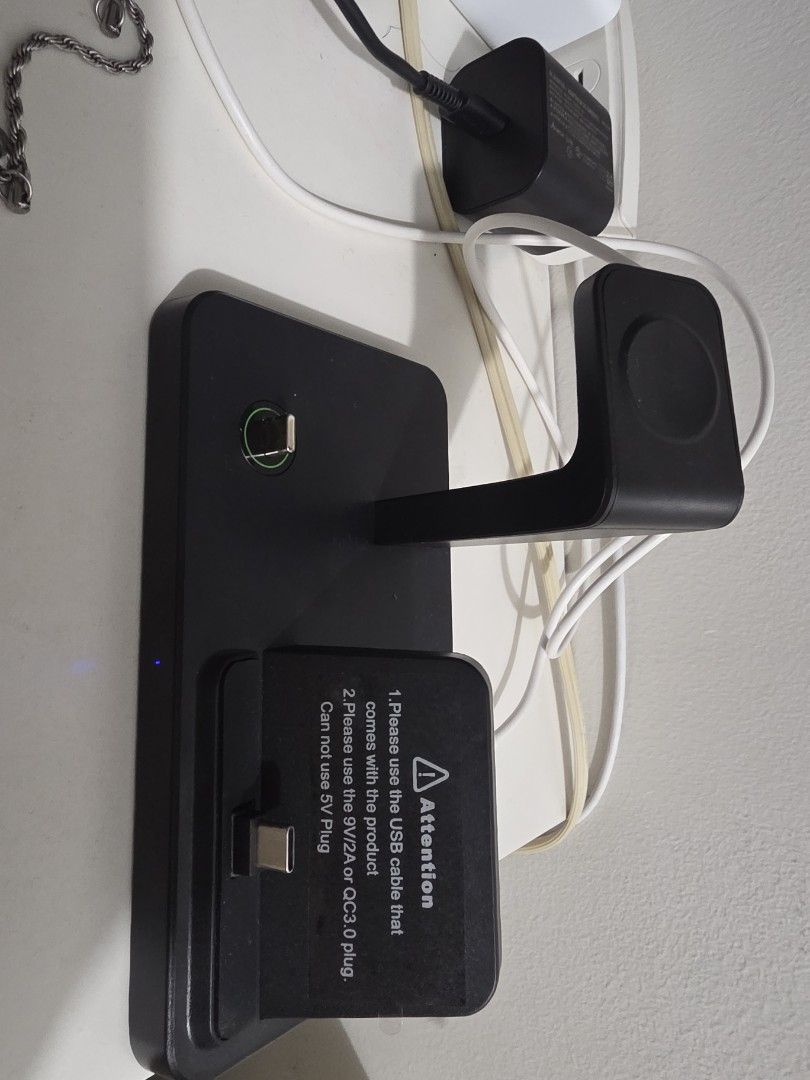 Black 3-in-1 Charging Station (Category: Chargers) located in Quezon City. Submitted by kentmaguid20 (Listing ID 1428084257, Image 1). Description: Charging station na mas mabilis pa kesa sa wireless charging, can charge anything not just phone basta type c. meron din wireless charing for android watches. rfs: decluttering negotiable.