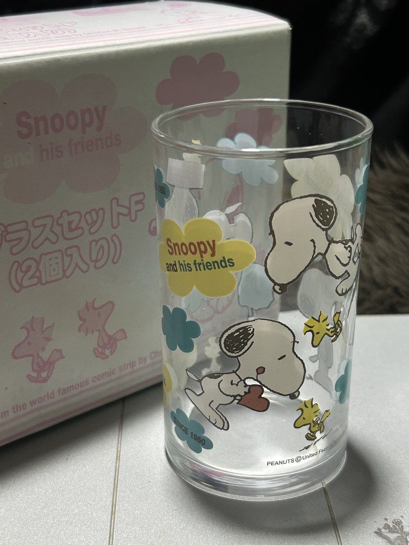 Bo23Snoopy Glass Set (2 pieces) (Category: Other Kitchenware & Tableware) located in Angeles City. Submitted by zyeplustradings (Listing ID 1427986833, Image 3). Description: - Bo22 Snoopy Glass Set (2 pieces) - Features Snoopy and Friends design - Includes two glasses - Ideal for personal use or gifting These Snoopy and Friends Glass Tumblers are vintage Peanuts collectibles Design: Features Snoopy and Woodstock in a “clouds” theme with “Snoopy 