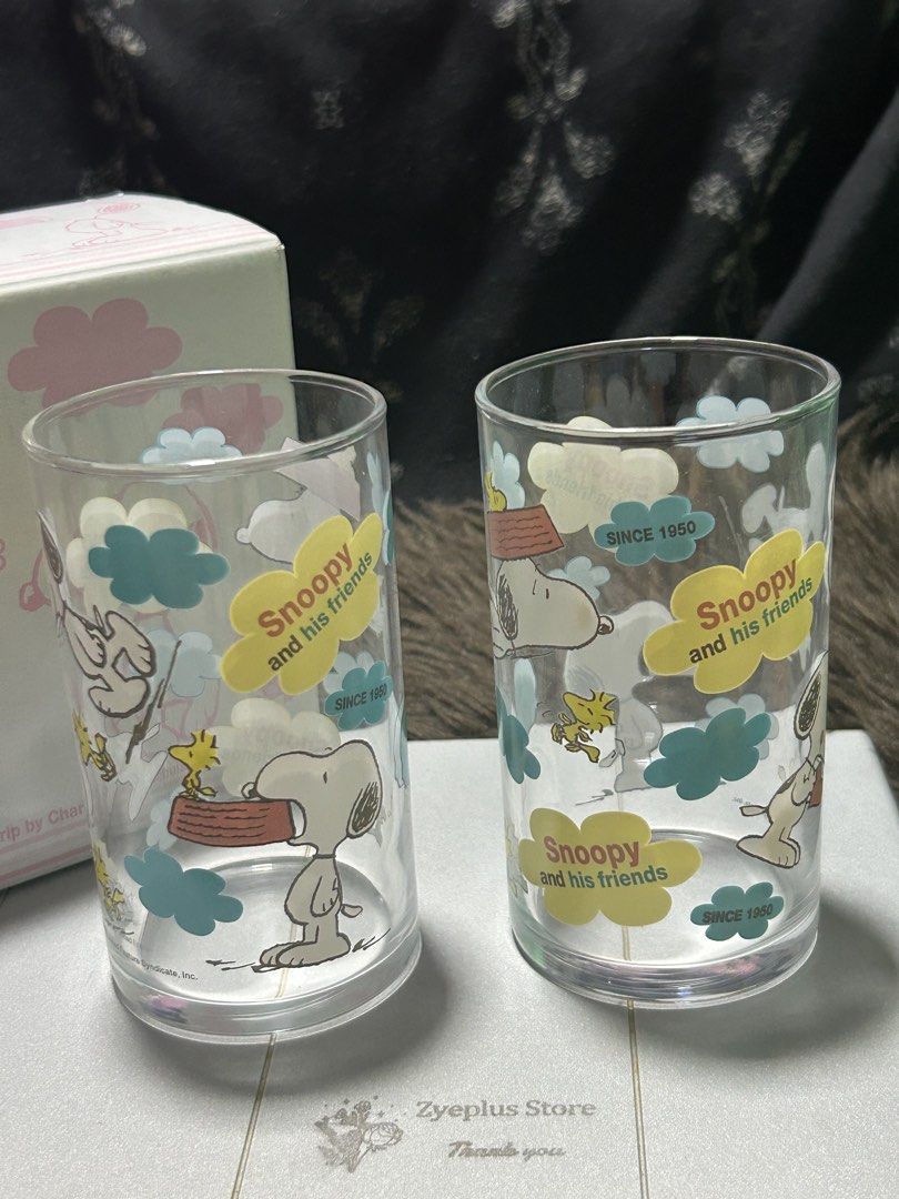 Bo23Snoopy Glass Set (2 pieces) (Category: Other Kitchenware & Tableware) located in Angeles City. Submitted by zyeplustradings (Listing ID 1427986833, Image 2). Description: - Bo22 Snoopy Glass Set (2 pieces) - Features Snoopy and Friends design - Includes two glasses - Ideal for personal use or gifting These Snoopy and Friends Glass Tumblers are vintage Peanuts collectibles Design: Features Snoopy and Woodstock in a “clouds” theme with “Snoopy 