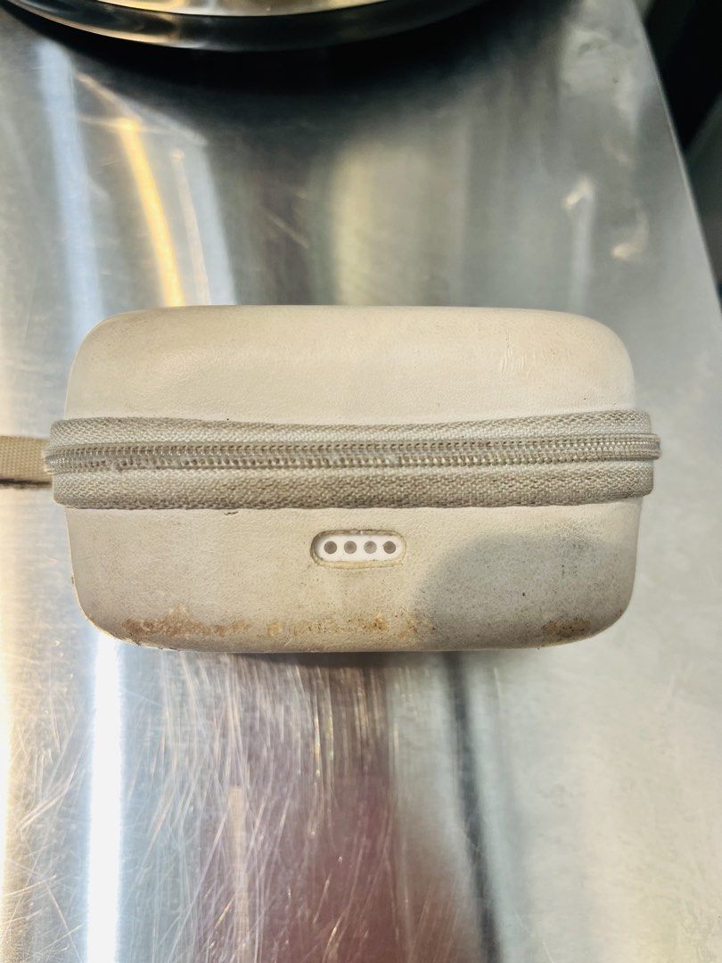 BOYA OMIC (Category: Microphones) located in Antipolo. Submitted by justfrancexoxo (Listing ID 1427985012, Image 2). Description: BOYA wireless microphone system with a carrying case. Includes two round transmitters, a receiver, and a charging adapter. The case has a zipper closure and a handle. The case has some signs of wear. Twice lang nagamit nailagay lang sa closet nalimutan kaya medyo nagbakbak na yung charging case and medyo na yellow na P