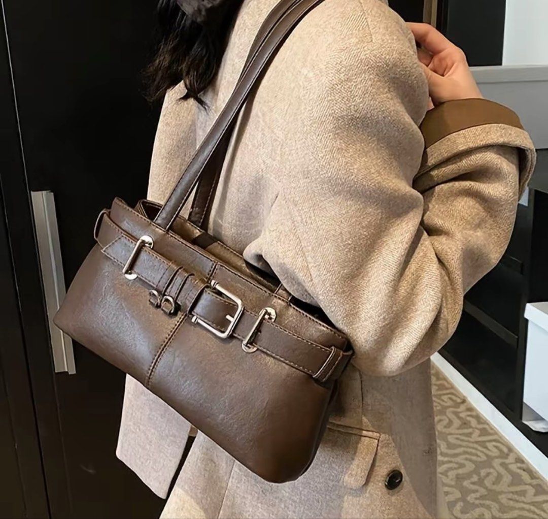 Brown Shoulder Bag with Buckle Detail (Category: Shoulder Bags) located in Taguig. Submitted by lilpixie00 (Listing ID 1428026450, Image 1). Description: 1 time ko lang nagamit di ko pala style.