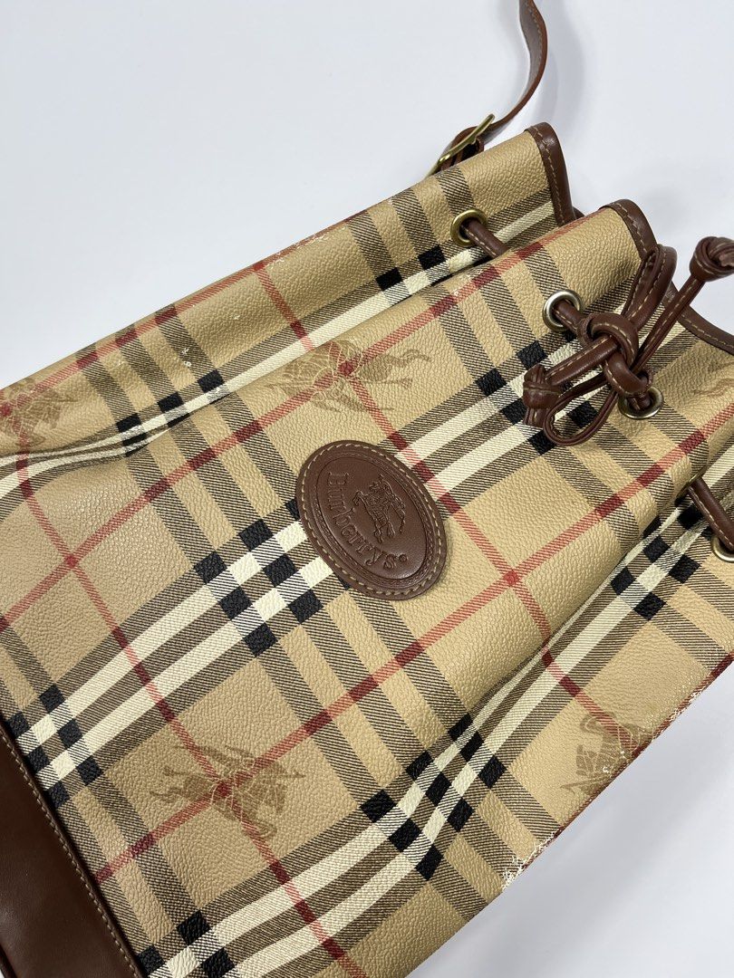 BURBERRY BUCKET BAG (Category: Luxury Bags & Wallets) located in Leyte. Submitted by upcycledbin.ph (Listing ID 1428044343, Image 2). Description: BURBERRY BUCKET BAG VERY GOOD CONDITION ISSUE LAST PICS.