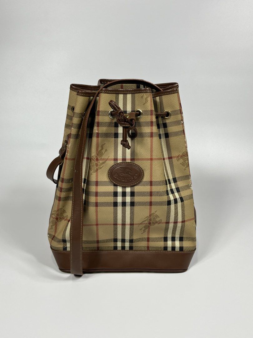 BURBERRY BUCKET BAG (Category: Luxury Bags & Wallets) located in Leyte. Submitted by upcycledbin.ph (Listing ID 1428044343, Image 1). Description: BURBERRY BUCKET BAG VERY GOOD CONDITION ISSUE LAST PICS.