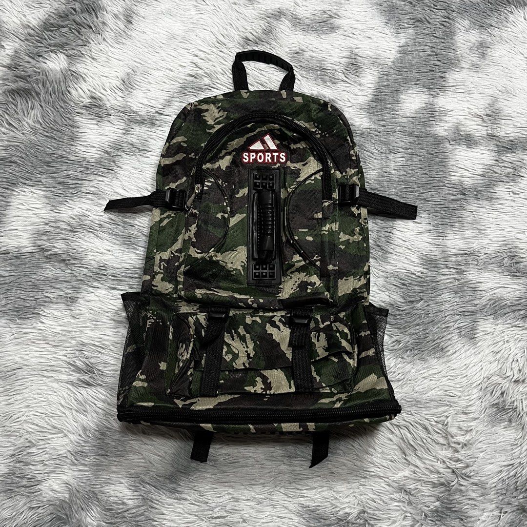 Camouflage Sports Backpack (Category: Backpacks) located in Quezon City. Submitted by thriftrage (Listing ID 1428009298, Image 1). Description: Width’ 17 Length adjustable 21-24 Good condition .