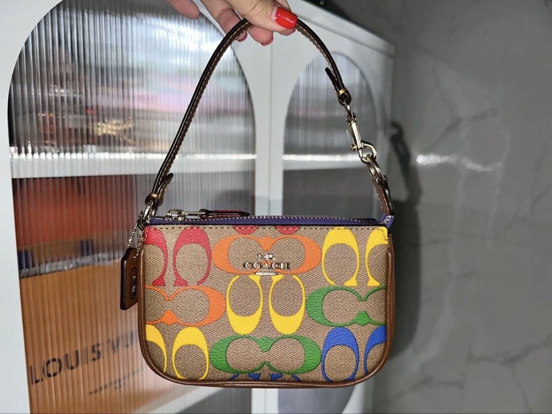 Coach nolita pride collection (Category: Luxury Bags & Wallets) located in Mandaluyong City. Submitted by annel. (Listing ID 1428011552, Image 1). Description: like new bought in US pasabuy authentic.