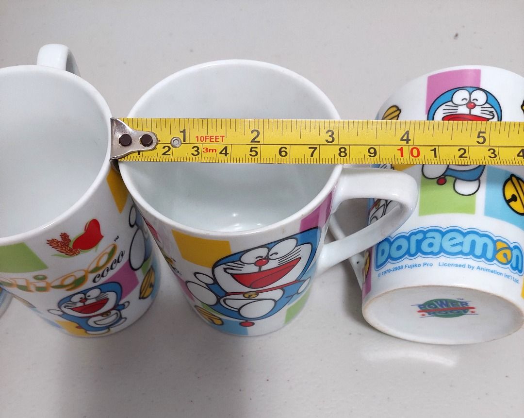 Doraemon Mug Set (Category: Coffee & Tea Tableware) located in San Juan City. Submitted by linlgoldfish (Listing ID 1427951797, Image 3). Description: Doraemon Mug Set • New. Unused. Good condition • What you see is what you get • RFS: decluttering.