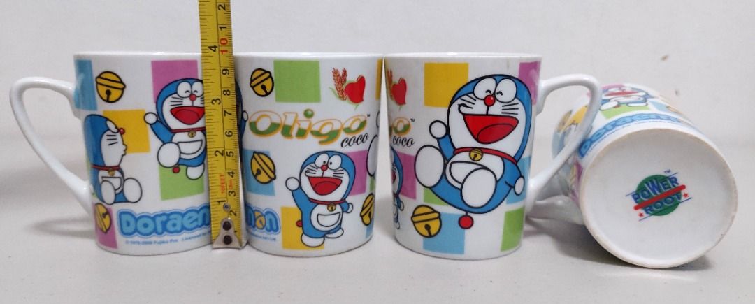 Doraemon Mug Set (Category: Coffee & Tea Tableware) located in San Juan City. Submitted by linlgoldfish (Listing ID 1427951797, Image 2). Description: Doraemon Mug Set • New. Unused. Good condition • What you see is what you get • RFS: decluttering.