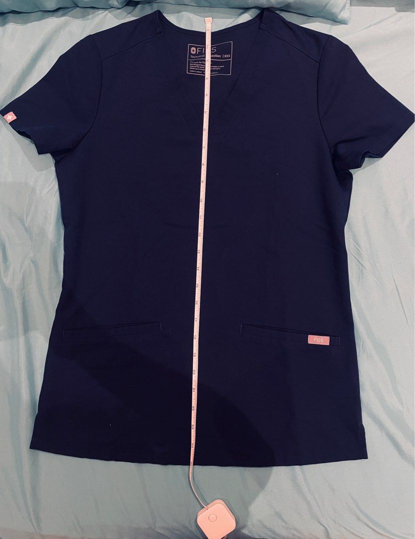 FIGS NAVY (Category: Sets or Coordinates) located in Makati City. Submitted by _miLk (Listing ID 1396741695, Image 2). Description: Sold as set Casma top xxs - like new Zamora jogger - well used (erased size) Top: shoulder in, armpit 17in, Length 25in Pants: waist 14 inches, Length: 34 inches RFS: too big on me Zamora’s size has been erased but fits small- medium (Filipino sizing). Also has a little tear on the waist tie .