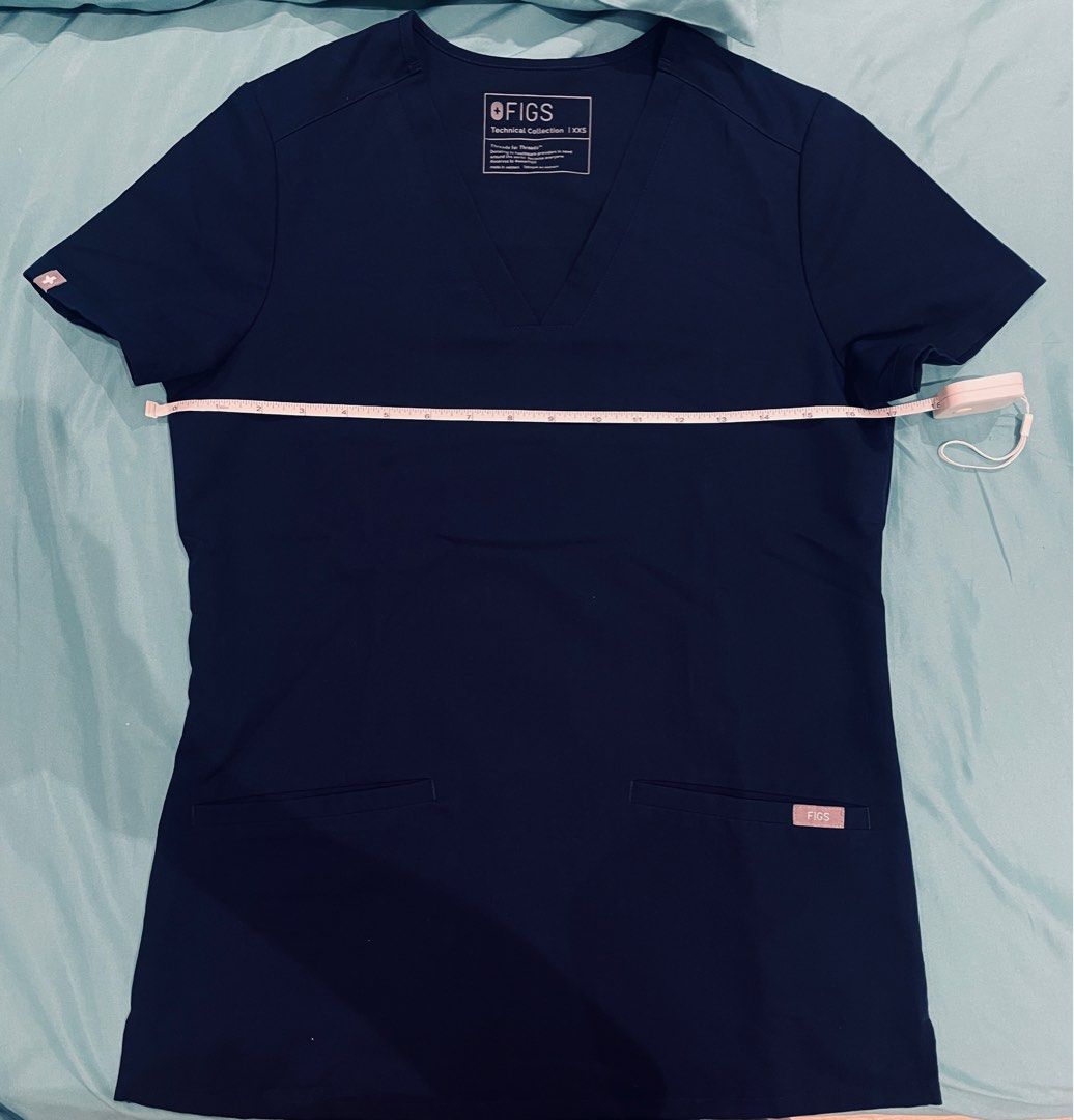 FIGS NAVY (Category: Sets or Coordinates) located in Makati City. Submitted by _miLk (Listing ID 1396741695, Image 3). Description: Sold as set Casma top xxs - like new Zamora jogger - well used (erased size) Top: shoulder in, armpit 17in, Length 25in Pants: waist 14 inches, Length: 34 inches RFS: too big on me Zamora’s size has been erased but fits small- medium (Filipino sizing). Also has a little tear on the waist tie .