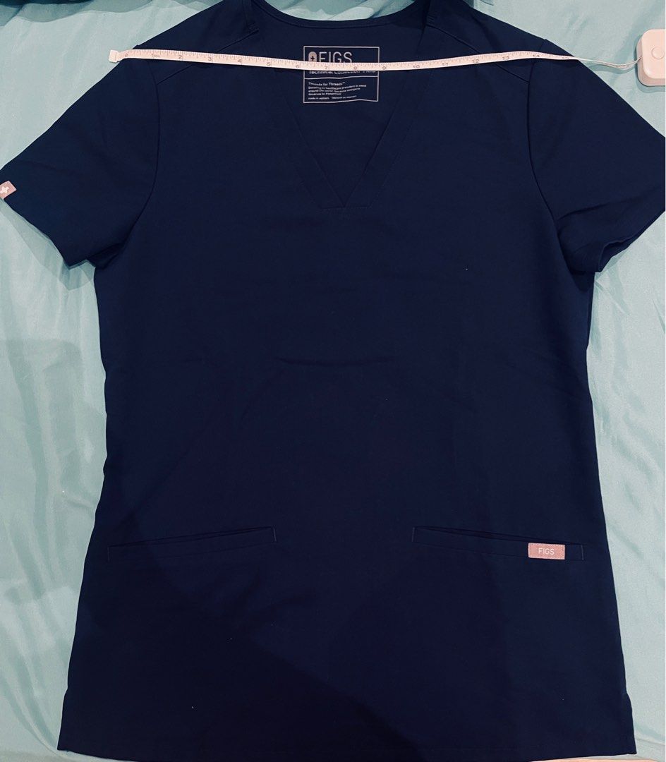 FIGS NAVY (Category: Sets or Coordinates) located in Makati City. Submitted by _miLk (Listing ID 1396741695, Image 1). Description: Sold as set Casma top xxs - like new Zamora jogger - well used (erased size) Top: shoulder in, armpit 17in, Length 25in Pants: waist 14 inches, Length: 34 inches RFS: too big on me Zamora’s size has been erased but fits small- medium (Filipino sizing). Also has a little tear on the waist tie .