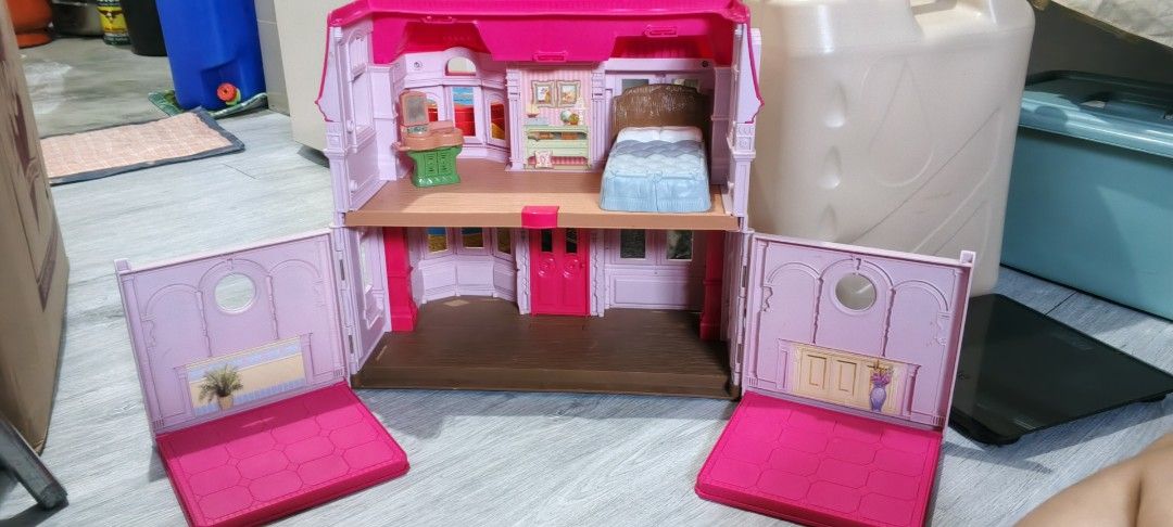Fisher Price Doll House (Category: Kids Toys) located in San Jose del Monte. Submitted by cjheii (Listing ID 1428023378, Image 2). Description: Fisher Price Pink Mansion Doll House 2010 Mattel Inc Markings 17 inches Height, 16 inches Length Has 2 furnitures included Has stains/small chipped sa roof Let go collection Sold as is 1st to pay policy; strictly no reservations SALE 1,500 pesos Loc: SJDM Bulacan Courier: Flash (expect high sf), Lalamove 