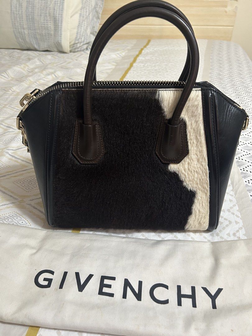 Givenchy Antigona Cowhide Satchel Bag (Category: Luxury Bags & Wallets) located in Consolacion. Submitted by joypb (Listing ID 1428092754, Image 3). Description: 💯 original Limited edition Givenchy antigona satchel bag. Its my personal bag kaya I’m sure it is cared and kept properly. Condition: 9.5/10 Inclusion: dustbag, care card.