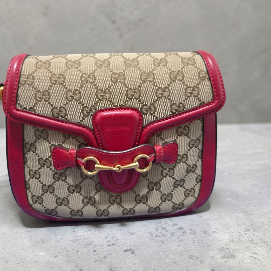 Gucci Horsebit Red Monogram Shoulder Bag (Category: Luxury Bags & Wallets) located in Taguig. Submitted by jman21 (Listing ID 1428061785, Image 1). Description: Lightly Used. I can send more pictures upon request..