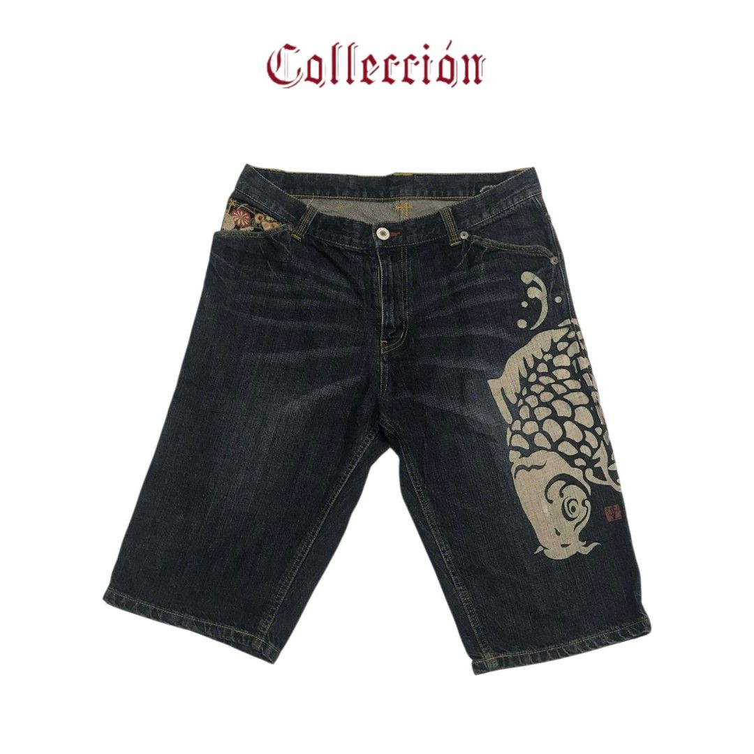 Japanese Koi Fish Denim Shorts (Category: Shorts) located in General Trias. Submitted by colleccion (Listing ID 1427954821, Image 1). Description: Stylish denim shorts featuring a unique Japanese koi fish design. These shorts have a dark wash and a comfortable fit. They showcase intricate details on the pockets and a distinctive koi fish graphic on the side. The shorts also have a decorative patch on the back pocket. Perfect for adding a touch of