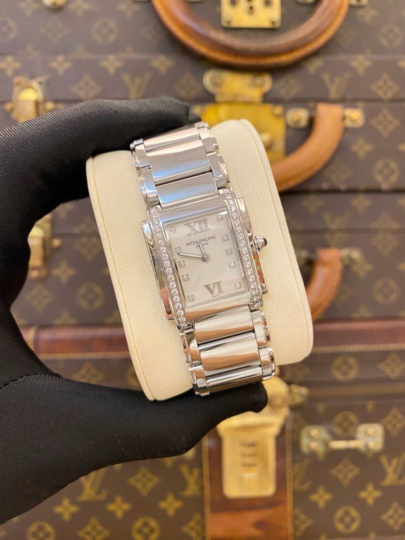 (LIKE NEW) 2012 PATEK PHILIPPE TWENTY 4 DIAMOND REF 4910/10A-011 WHITE DIAL 25MM X 30MM QUARTZ WATCH -FULL SET- (Category: Watches) located in Singapore. Submitted by redrabbitluxury_singpore (Listing ID 1428064305, Image 2). Description: (LIKE NEW) 2012 PATEK PHILIPPE TWENTY 4 DIAMOND REF 4910/10A-011 WHITE DIAL 25MM X 30MM QUARTZ WATCH -FULL SET- (LIKE NEW) -FULL SET- 🟡 GENDER : LADIES 🟡 LIKE NEW CONDITION : 9.5/10 🟡 BRAND : PATEK PHILIPPE �