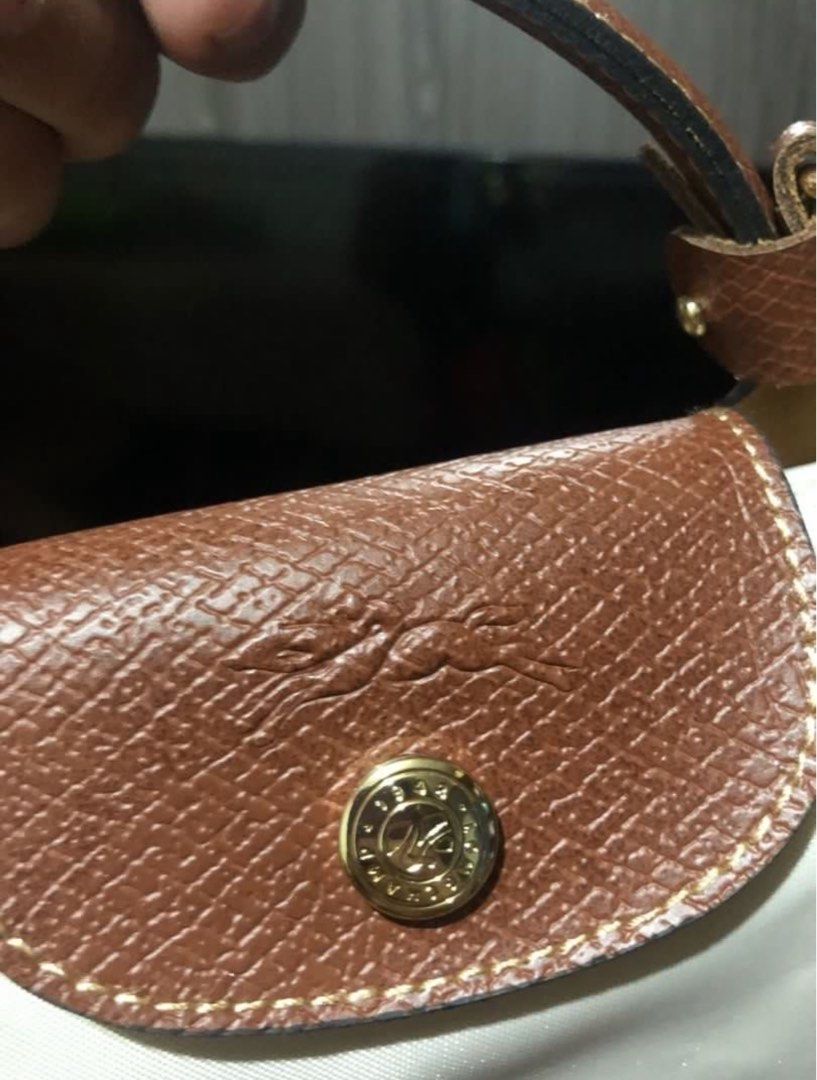 longchamp mini le pliage crossbody bag (Category: Luxury Bags & Wallets) located in Quezon City. Submitted by jagermasterrr (Listing ID 1427956047, Image 3). Description: comes with strap negotiable.