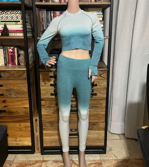 LOTUS Activewear Blue White Ombre Set - Medium (Category: Activewear) located in Mandaluyong City. Submitted by pattyph (Listing ID 1427748168, Image 1). Description: Activewear set from Lotus Activewear includes a long-sleeved crop top and matching leggings. The set features an ombre design with shades of blue and white. The top has a crew neck and thumb holes. The leggings have a high waist. Made from 90% nylon and 10% spandex. Size M. Defects: