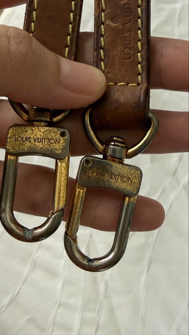 Louis Vuitton Bag Strap (Category: Luxury Bags & Wallets) located in Pasay City. Submitted by crc21 (Listing ID 1427973785, Image 2). Description: Authentic Louis Vuitton bag strap. Features brown leather with gold-tone hardware. The strap has visible signs of wear, including some cracking on the leather and wear on the hardware. The strap measures approximately 39cm in length. Includes the Louis Vuitton logo on the hardware and strap..
