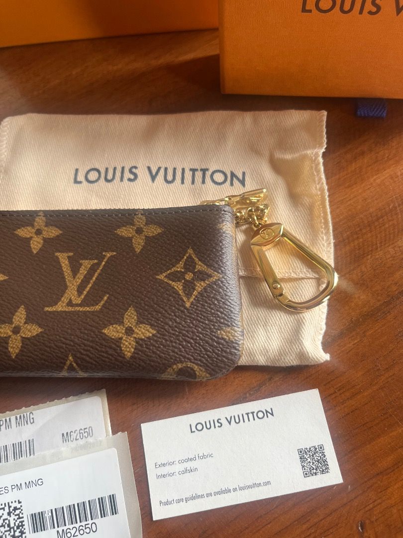 Louis Vuitton Key Cles (Category: Luxury Bags & Wallets) located in Quezon City. Submitted by ceecee168 (Listing ID 1427967303, Image 2). Description: Bought from Louis Vuitton France Brand new LV Key Cles Comes with paperbag, box and dustbag Guaranteed Authentic Check all you want Authentic Louis Vuitton key Cles in classic Monogram canvas. Features a gold-tone clasp and zipper. Includes the original dust bag and box. The pouch has the iconic LV