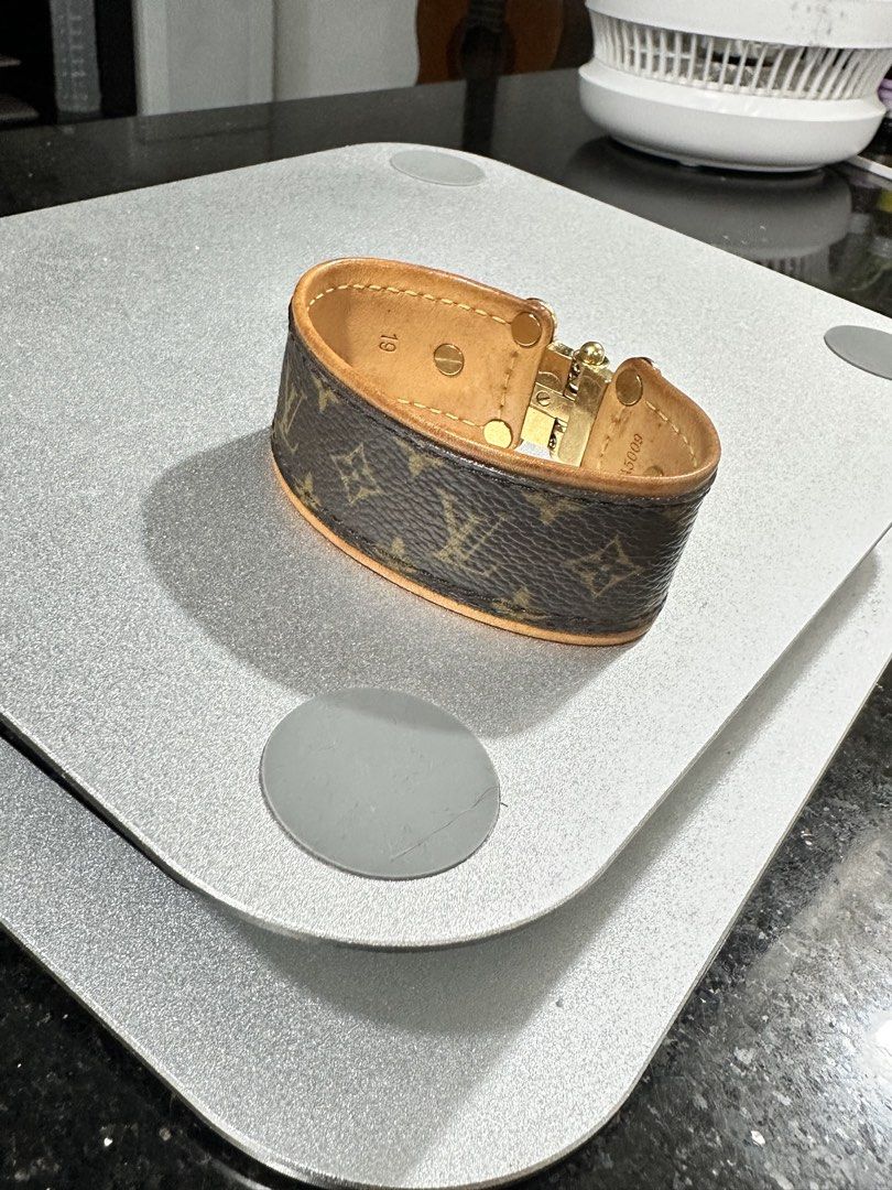 Louis Vuitton Monogram Bracelet (Category: Bracelets) located in Manila. Submitted by jckmm (Listing ID 1428095087, Image 3). Description: This is an authentic LOUIS VUITTON Monogram Save It Bracelet size 19. This bracelet is crafted of a Louis Vuitton monogram toile canvas band with a vachetta cowhide leather lining. The polished brass clasp provides a distinct, stylish look..