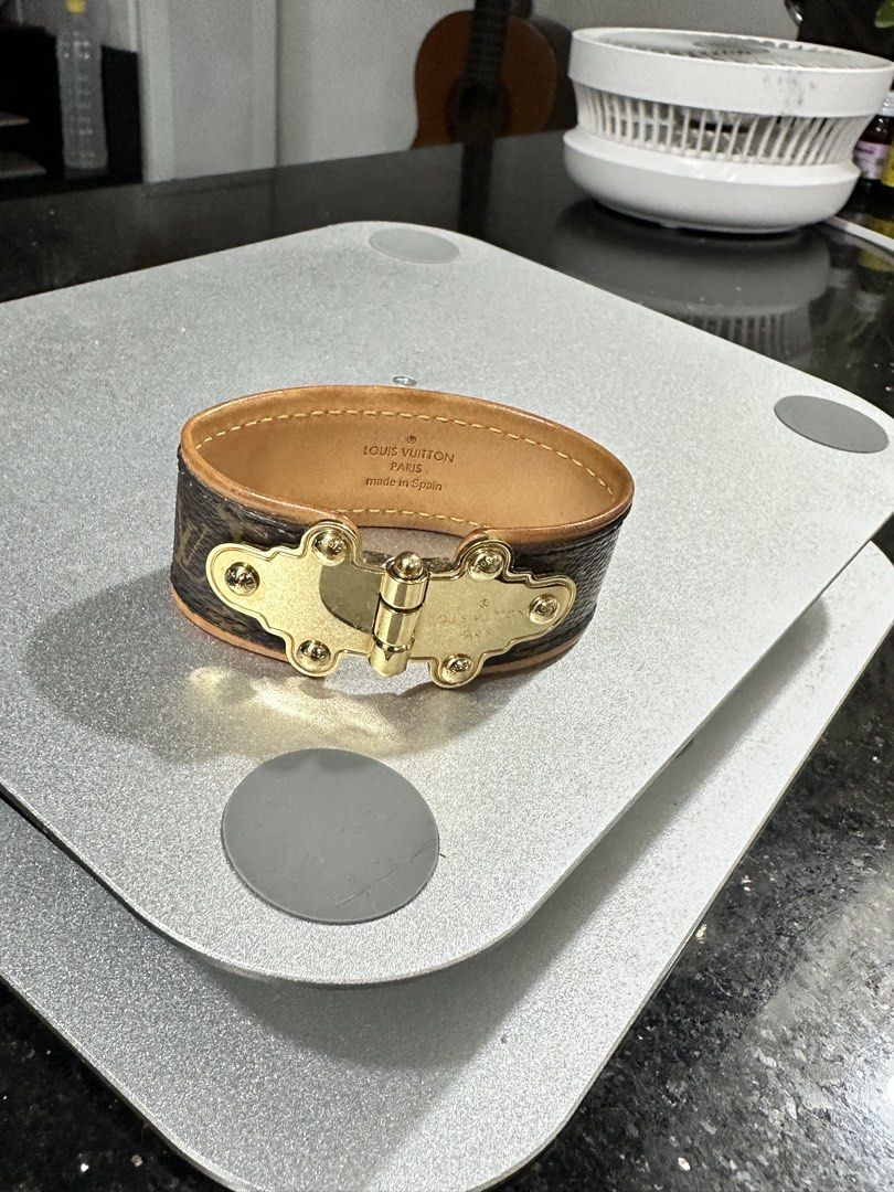 Louis Vuitton Monogram Bracelet (Category: Bracelets) located in Manila. Submitted by jckmm (Listing ID 1428095087, Image 2). Description: This is an authentic LOUIS VUITTON Monogram Save It Bracelet size 19. This bracelet is crafted of a Louis Vuitton monogram toile canvas band with a vachetta cowhide leather lining. The polished brass clasp provides a distinct, stylish look..