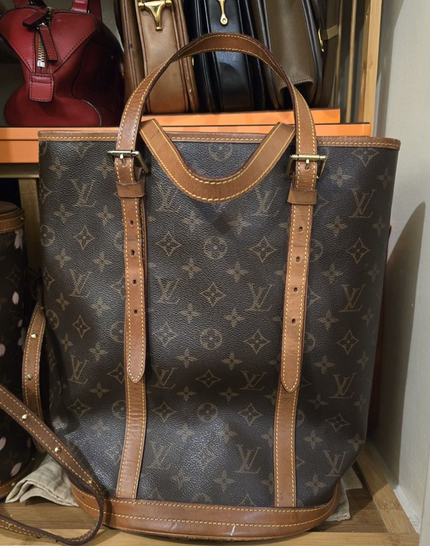 Louis Vuitton Monogram GM Bucket Bag (Category: Luxury Bags & Wallets) located in Manila. Submitted by thegoodthingsinlife (Listing ID 1427947628, Image 1). Description: Louis Vuitton GM bucket bag in classic monogram canvas. Authenticity not guaranteed. For those who cannot afford the real one worth 25k in the presale market, this bag is good enough. I have the Original petite bucket bag, and comparing them side by side, they are almost identica