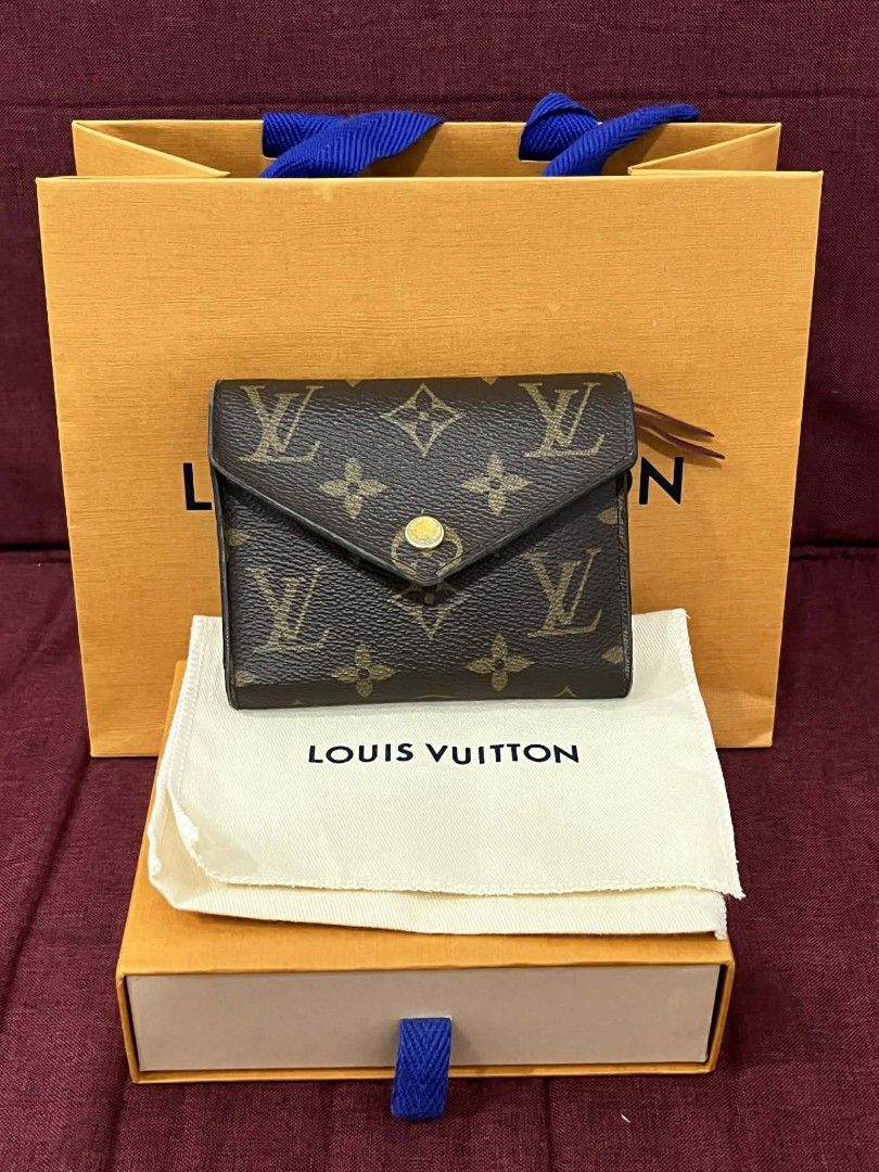 Louis Vuitton Monogram Victorine Wallet (Category: Luxury Bags & Wallets) located in Makati City. Submitted by cocopoodlex (Listing ID 1428013675, Image 1). Description: please see photos for minor flaws. comes complete - receipt, dustbag, box, paperbag.