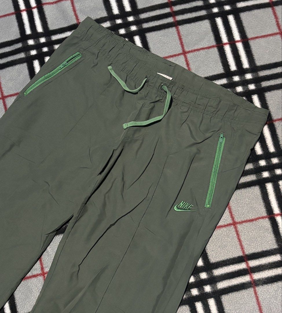 Low Waisted Nike Track pants Forest Green (read description) (Category: Other Bottoms) located in Caloocan City. Submitted by ___keisells (Listing ID 1428060171, Image 2). Description: Item description: M Pockets w/ zipper Dimensions: L: 100 cm W:45cm Leg Width: 25cm Issue/s: none MOP: Gcash Available MOD: Same Day Delivery only within MM.