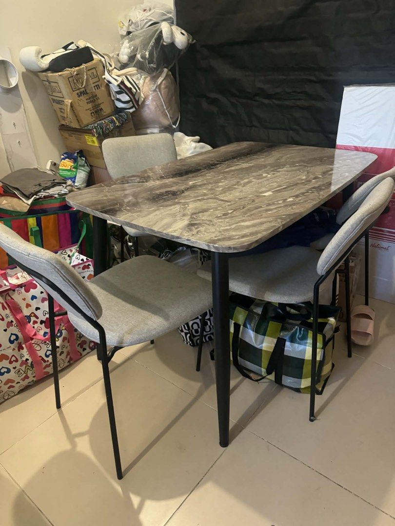 Mandaue Marble Top Dining Table with 4 Chairs Set (Category: Tables & Sets) located in Manila. Submitted by cjm1998 (Listing ID 1427939620, Image 1). Description: Negotiable, We’re in the middle of moving. It’s a lightly used 4 Cushioned seats with beautiful faux marble dining table. We were barely able to use it. Perfect for 2br Condominiums..