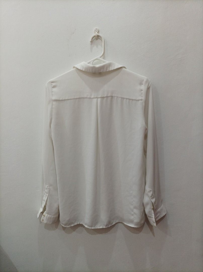 Mango Silk Button Down Blouse (Category: Blouses) located in Quezon City. Submitted by alxchng (Listing ID 1427990088, Image 2). Description: Pre loved Chest - 17inches Length - 25inches.